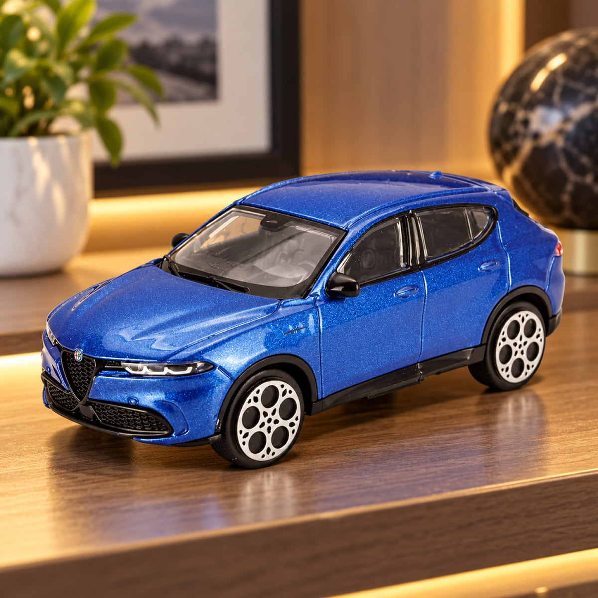 Model Bburago Alfa Romeo Tonale v měřítku 1:43 – modrý – ilustrační foto (AI)