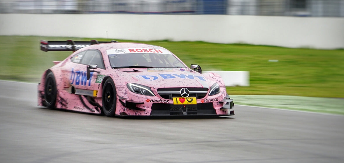 Model Mercedes-Benz DTM C63 AMG L. Auer v měřítku 1:43